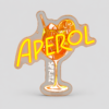 Neon sign shaped like a glass of Aperol Spritz with orange slices and the word APEROL in bright yellow-orange letters