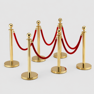 Golden stanchions connected by red rope barriers forming a queue or barrier setup.