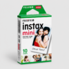 Fujifilm Instax Mini instant film box with a green top and a photo of two smiling people on the front, labeled 10 sheets.