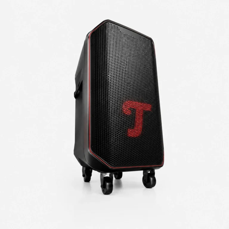 Portable loudspeaker on wheels with a red trim, black perforated front grille, standing on a white backdrop.