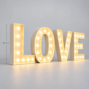 Giant illuminated LOVE marquee letters with warm bulbs, 120 cm tall, on a light floor.